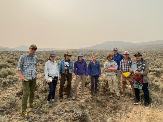 Crew of scientists enjoying a smoky day looking at soils at RCEW